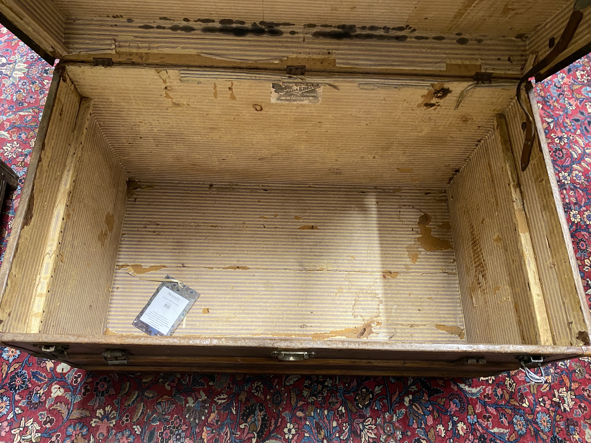 A late 19th century French travelling trunk with interior paper label “A. Bertrand, Paris”, length 106cm, width 60cm, height 66cm
